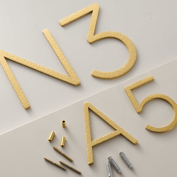 EZRA Characters in Hammered Satin Brass - meraki.