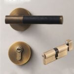 BEETHAM Solid Brass & Leather Lever Door Handles in Antique Brass