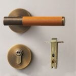 BEETHAM Solid Brass & Leather Lever Door Handles in Antique Brass