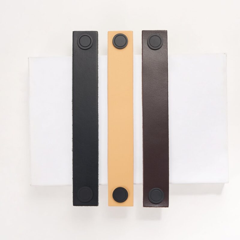 DIVES Griffe aus Leder und Messing