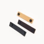 DIVES Griffe aus Leder und Messing