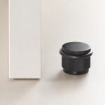 GUM Butoir de porte en laiton