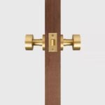 LUNO Pomello per porta in ottone massiccio