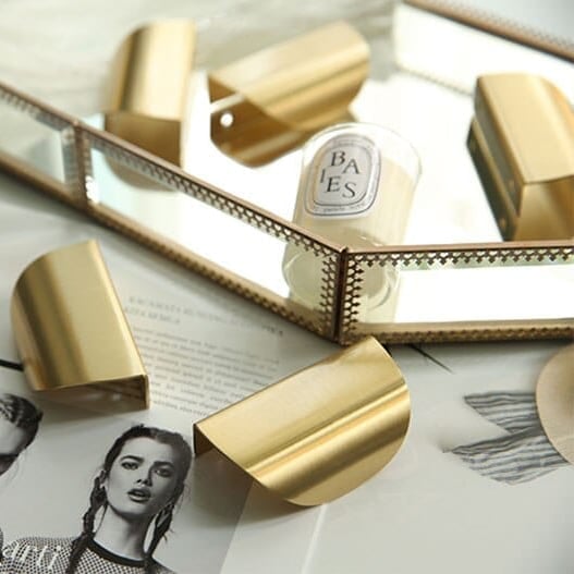 Tirador de puerta curvado de latón macizo LUSTE