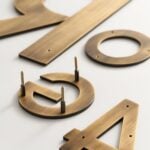 METRO Zahlen in Antik-Messing