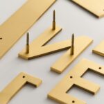 METRO-Zahlen aus satiniertem Messing