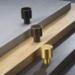 NECTA Messing knoppen