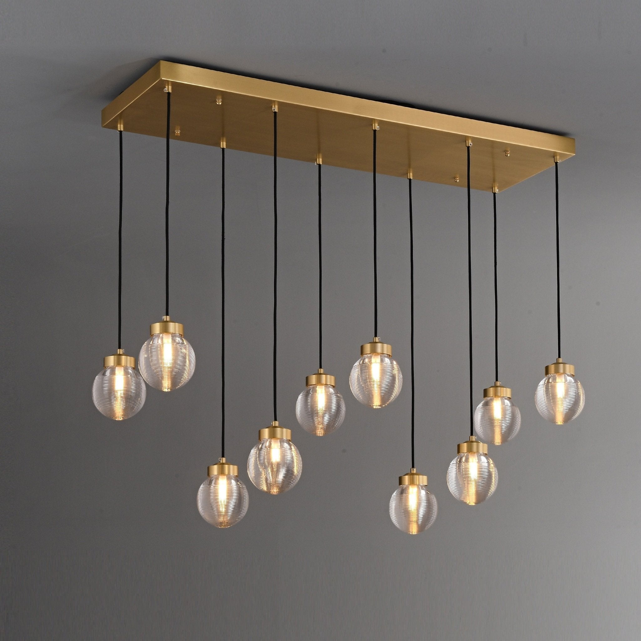 Handcrafted solid brass hardware and lighting. 19 ORBIS Brass Linear Chandelier - meraki.