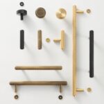 Maniglie zigrinate in ottone massiccio PLAKA